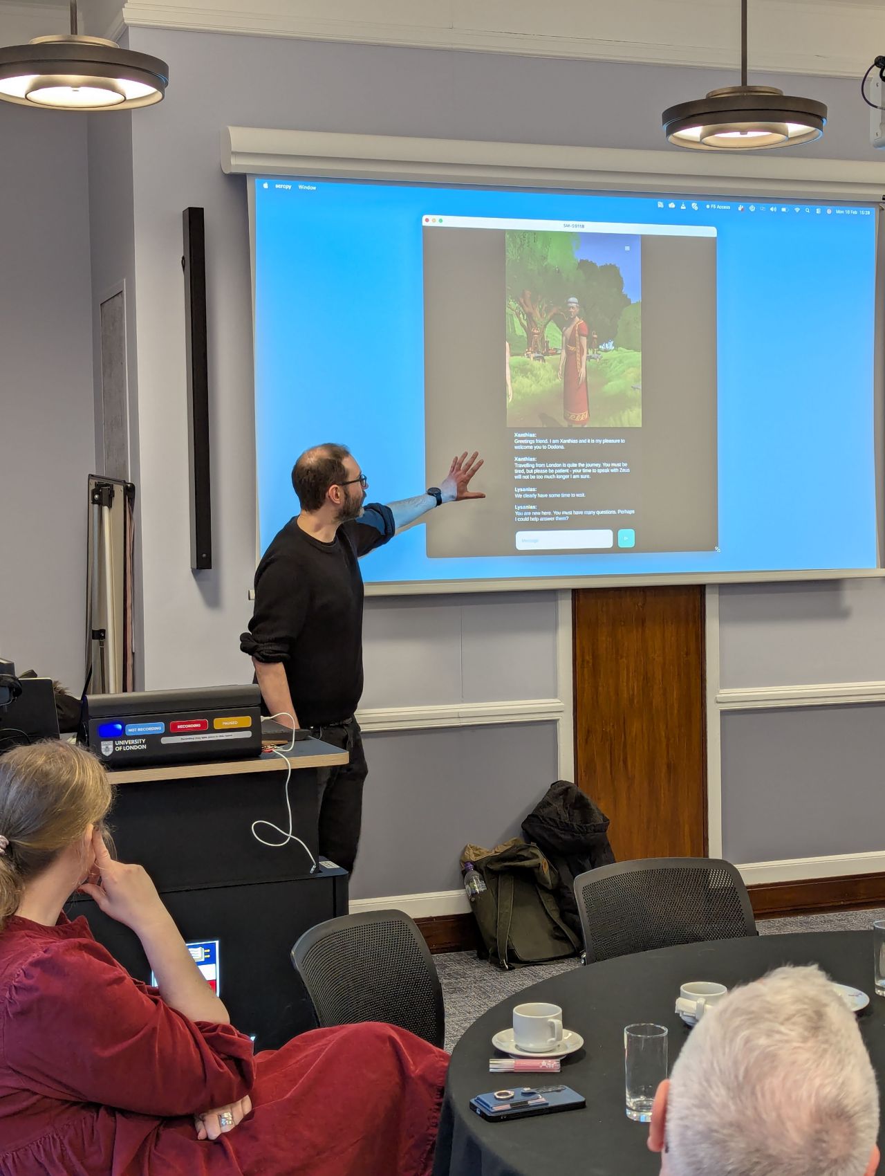 Photo: Chris presenting the AI in Antiquity project to trainee teachers at the Classical Association's Exploring AI in the Classics Classroom event (Senate House, University of London. February 2026).